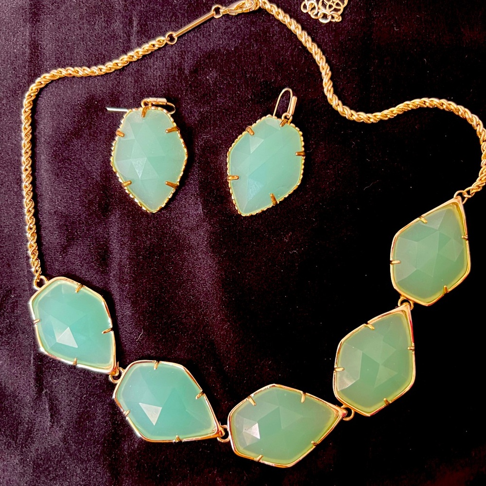 Kendra Scott necklace and earrings.